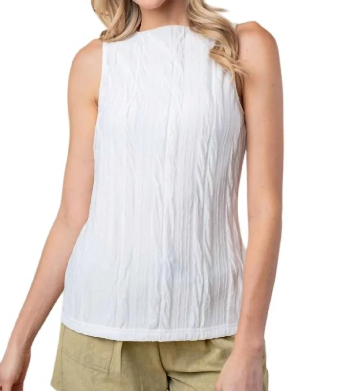 Wool sleeveless topSleeveless Solid Knit Top In Cream